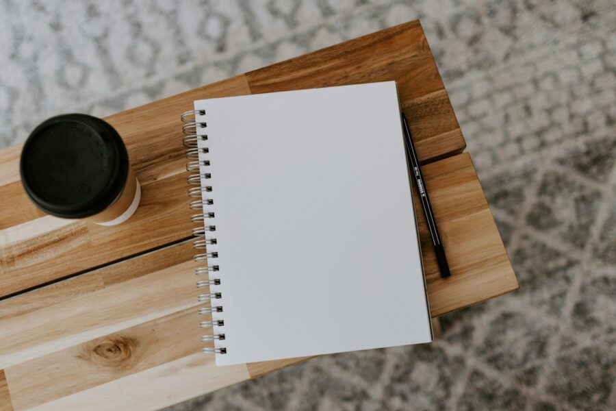 Notebook pen coffee expense tracking