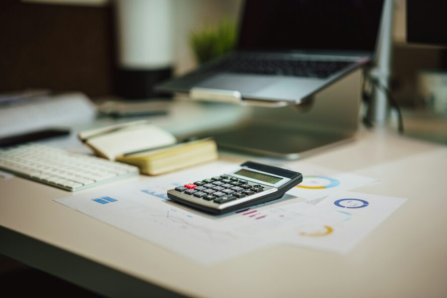 Tax forms calculator laptop pen
