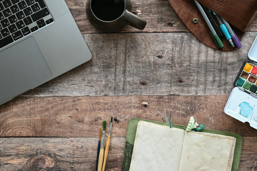 Credit card hands notebook wooden desk