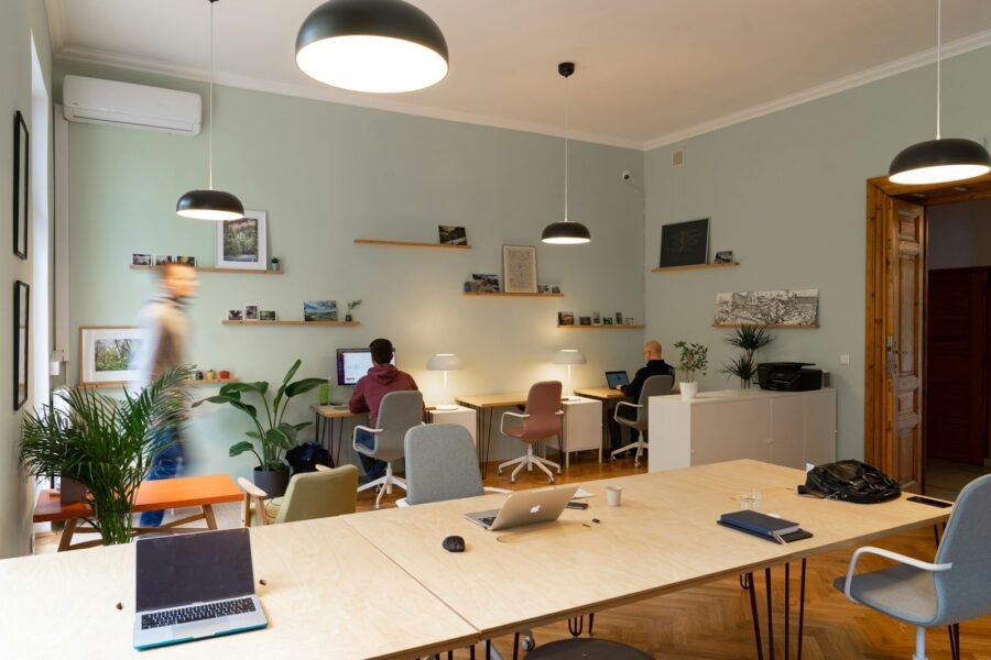 Coworking space laptops desks local city street view