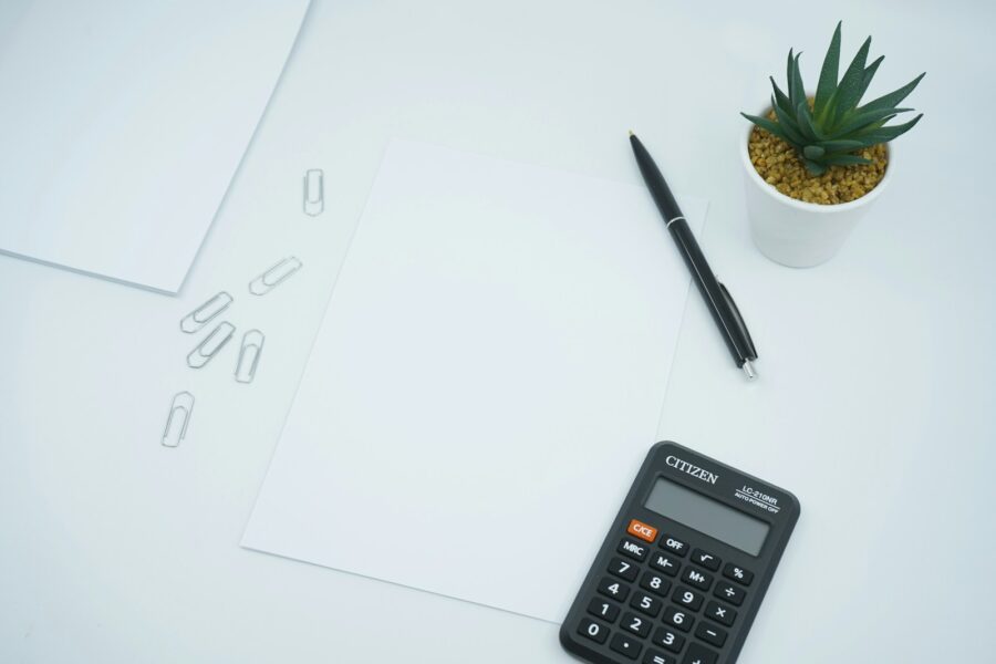 Tax forms calculator pen desk