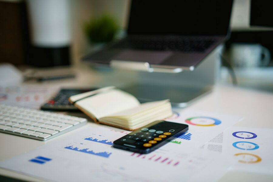 Stock market chart home office laptop