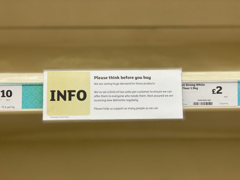Shopping aisle price labels closeup