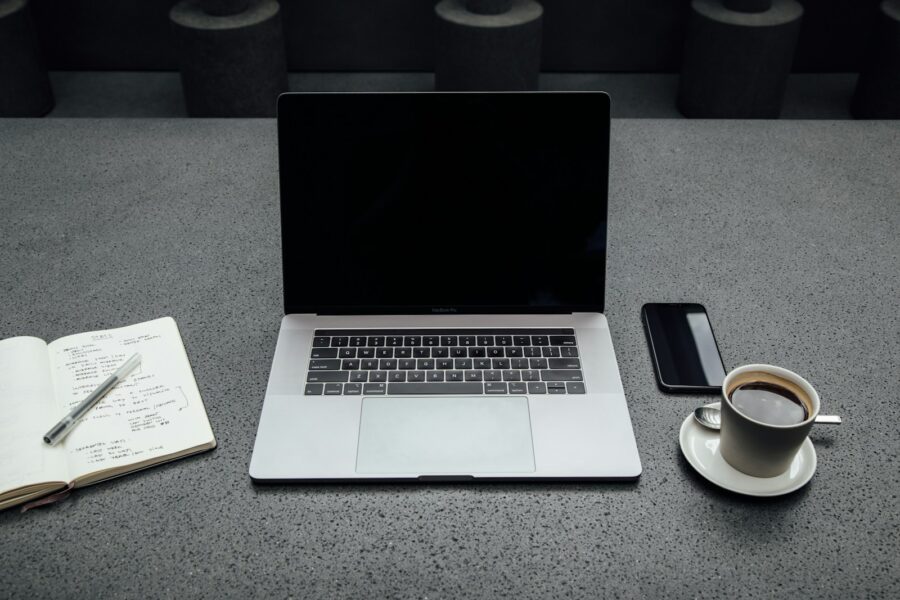 Subscription list notebook laptop coffee