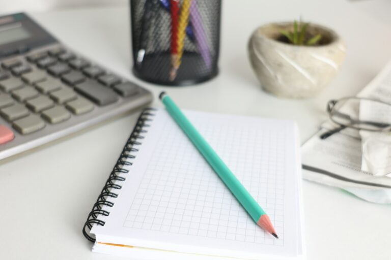 Calculator notebook pen desk creative professional working desk