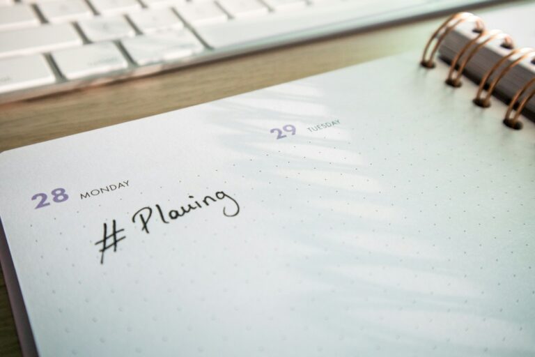 Closeup notebook handwritten spending plan