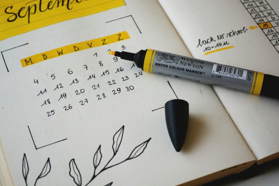 Calendar hourglass notebook pen