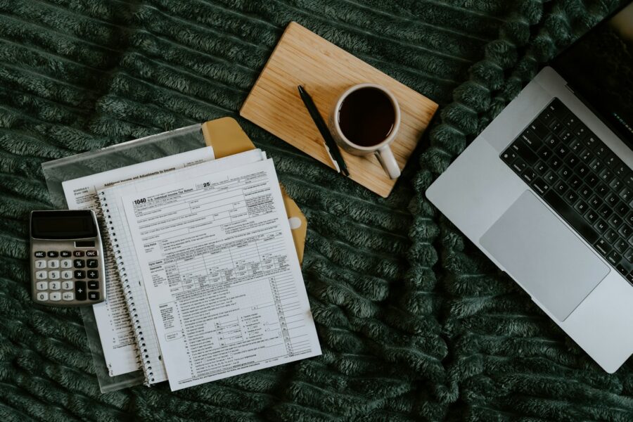 Loan documents calculator coffee