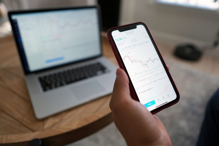Hands smartphone brokerage