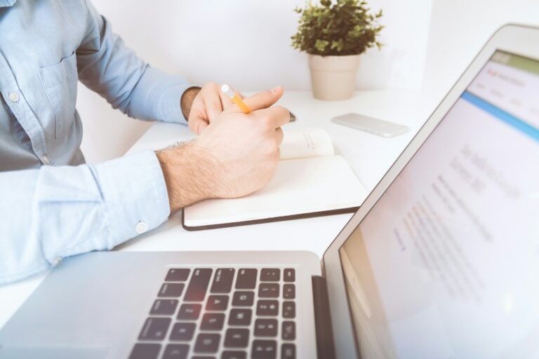 Person writing expenses