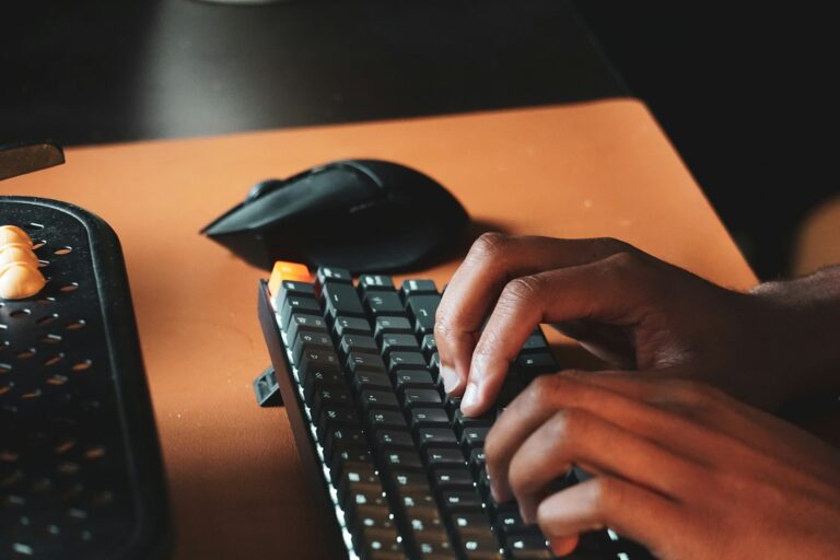 Person typing spreadsheet