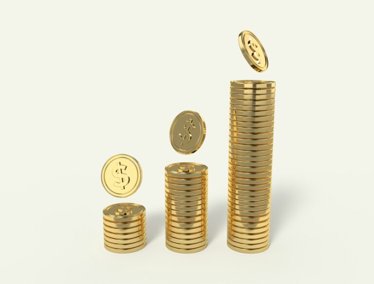 Stacked coins growing line chart desk