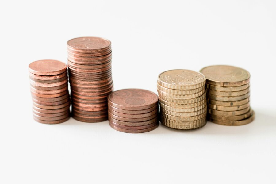 Stacked coins growing line chart desk