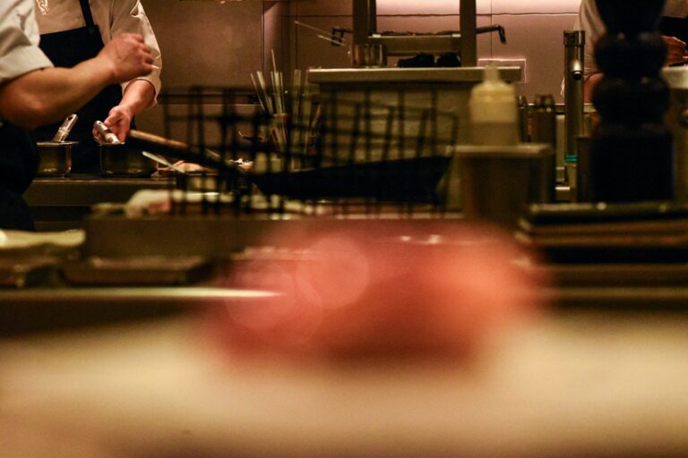 Restaurant kitchen chefs preparing food shopping basket vegetables