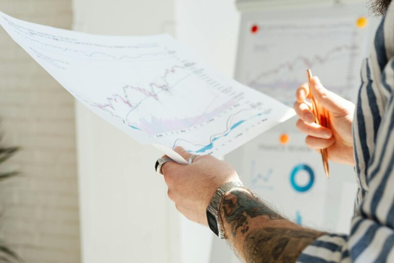 Investor reading sector etf fact sheet diversified stock