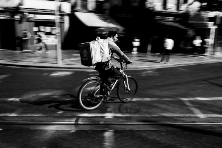 Bicycle courier delivering