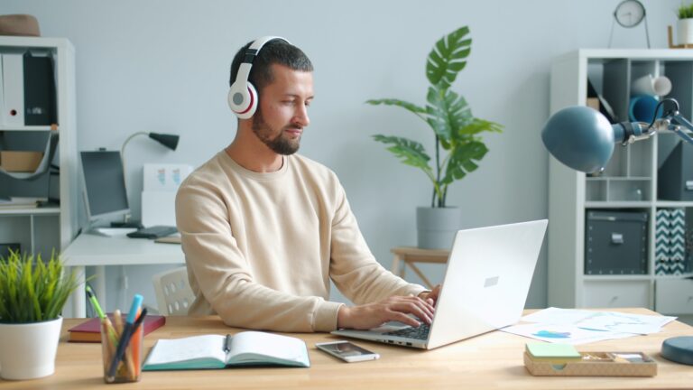 Home office desk laptop headphones notebook