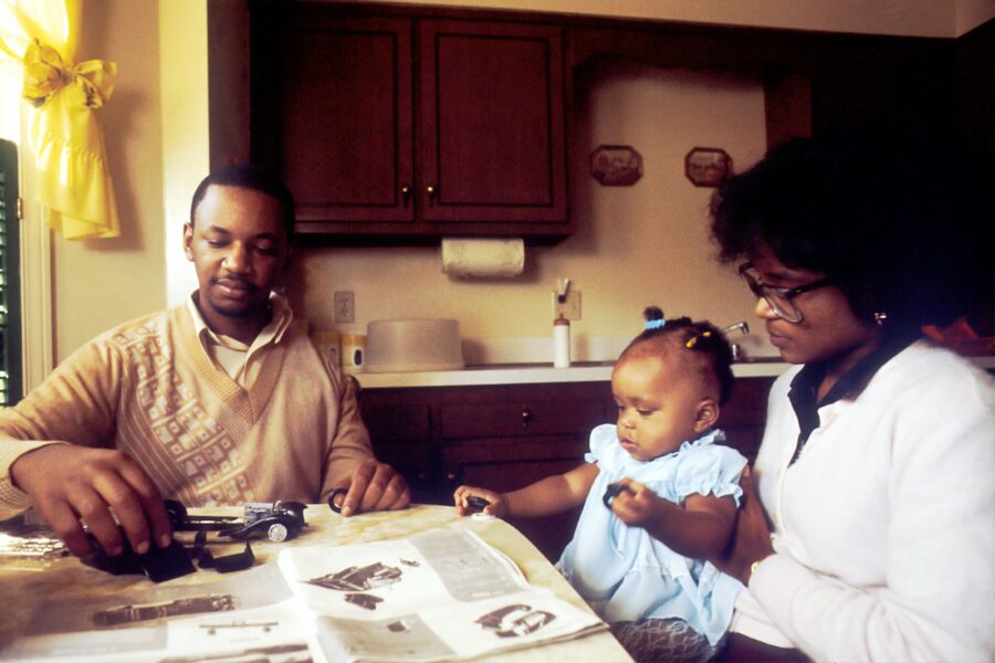 Family talking kitchen