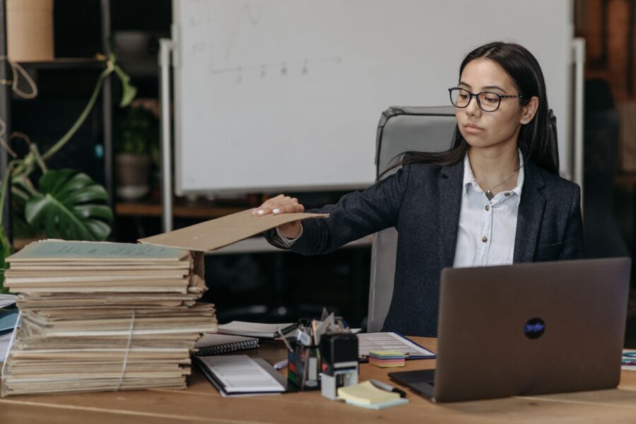 Person organizing laptop