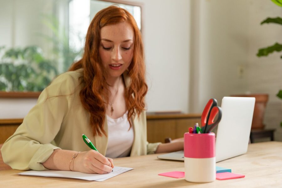 Person writing notebook