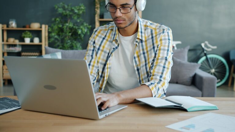 Person typing laptop