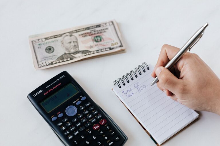 Person writing financial