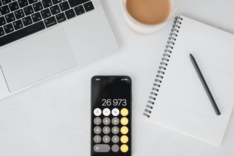 Kitchen table calculator notebook coffee