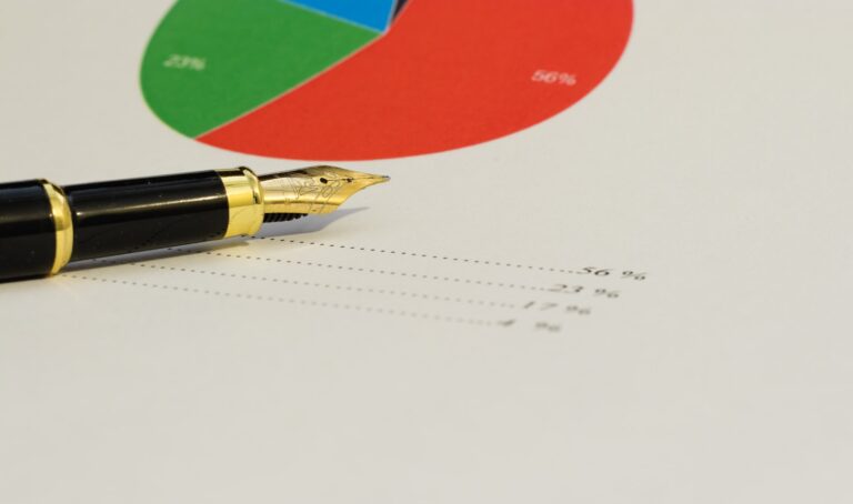 Closeup credit report document pen