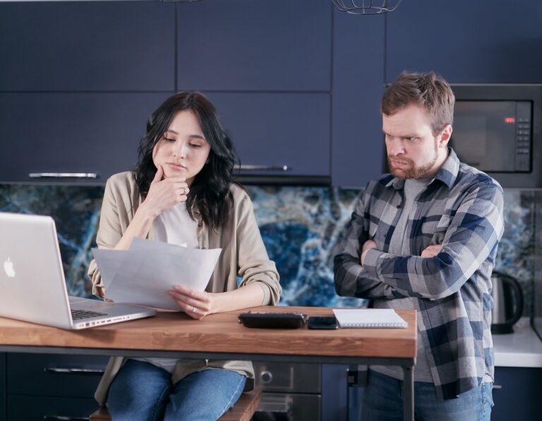 Couple reviewing budget