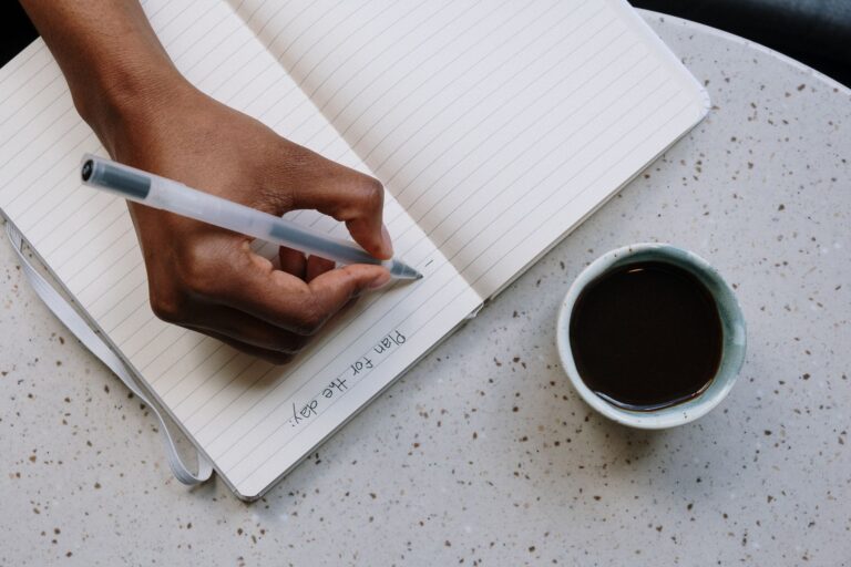 Person writing financial