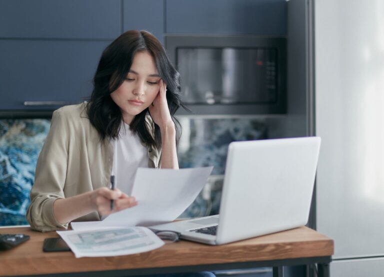 Woman reviewing expenses
