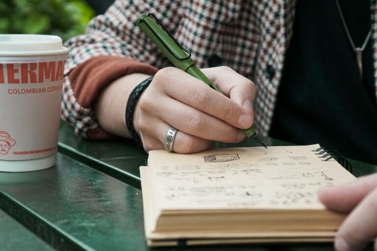 Person writing expenses