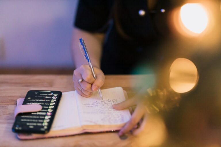 Person writing savings