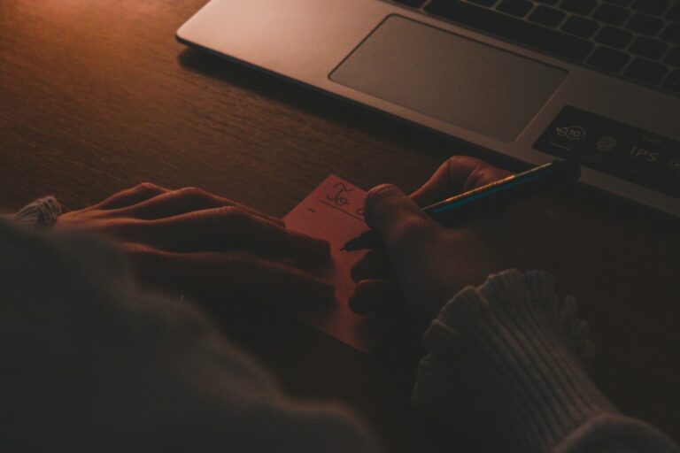 Person writing financial
