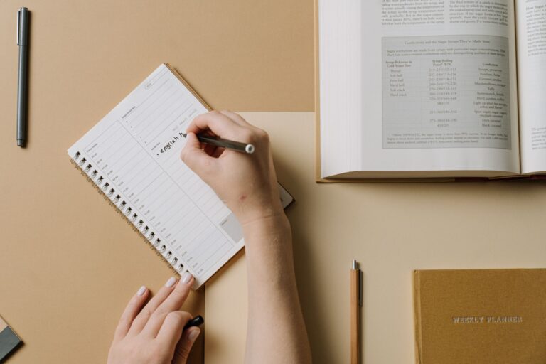 Person writing finances